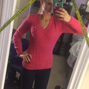 Pink Ralph Lauren sweater.